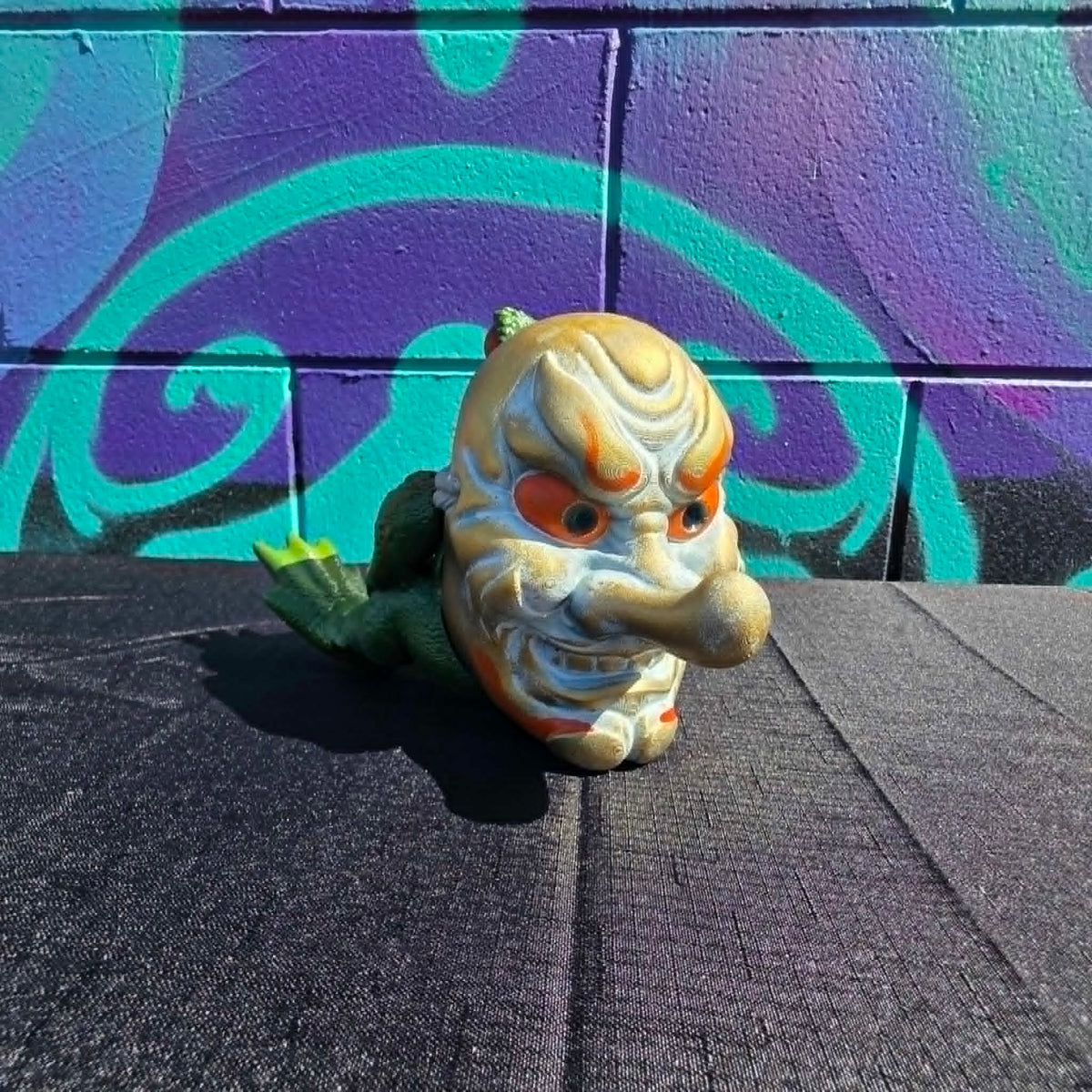 Pipe-Smoking Toad with Tengu Mask Statue